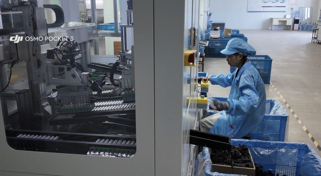 Workers assembling MXTOVEL brushless power tools in factory